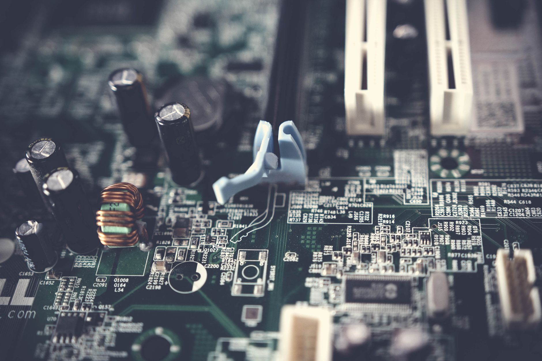 Detailed view of components on a computer motherboard, showcasing technology and circuitry. — Explore Advanced CAM Software S