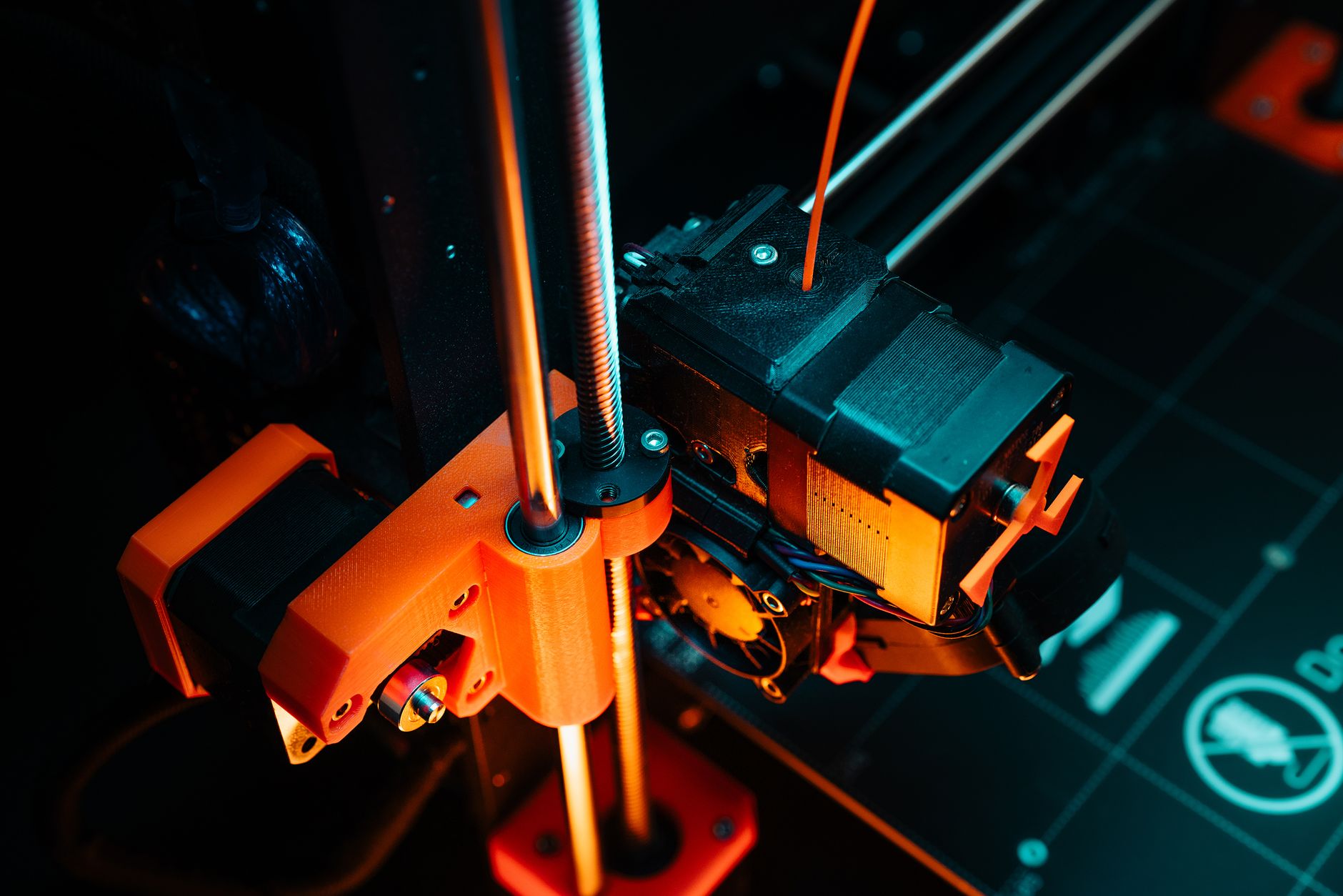 A colorful close-up of a 3D printer operating, showcasing mechanical precision and technology. — Precision Optimization Strat