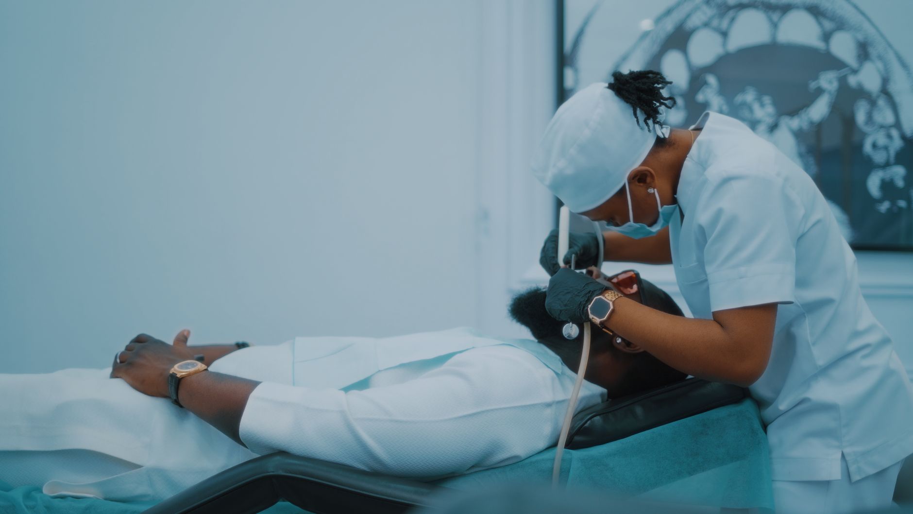 A dental professional performs a procedure on a patient in a Lagos clinic. — Step-by-Step Guide to Comparing Medicare Advanta